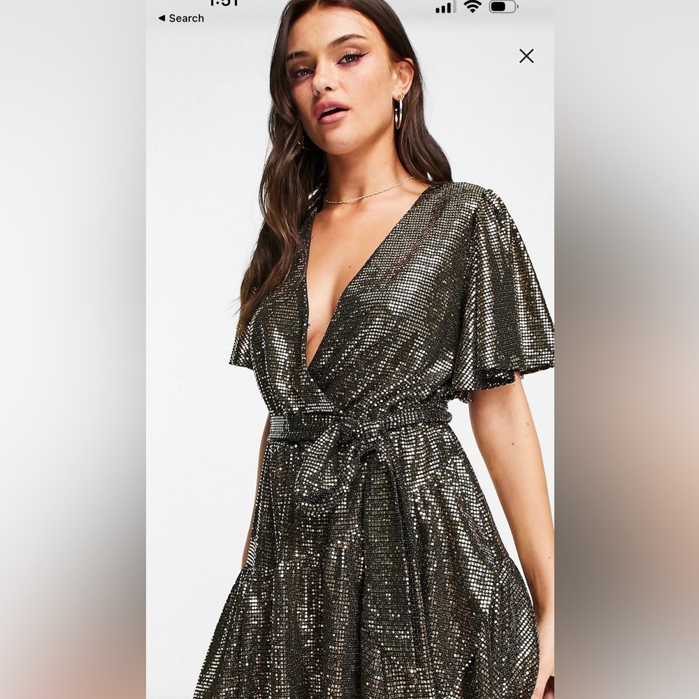 Brand new with tags Black and gold sequins midi dress.